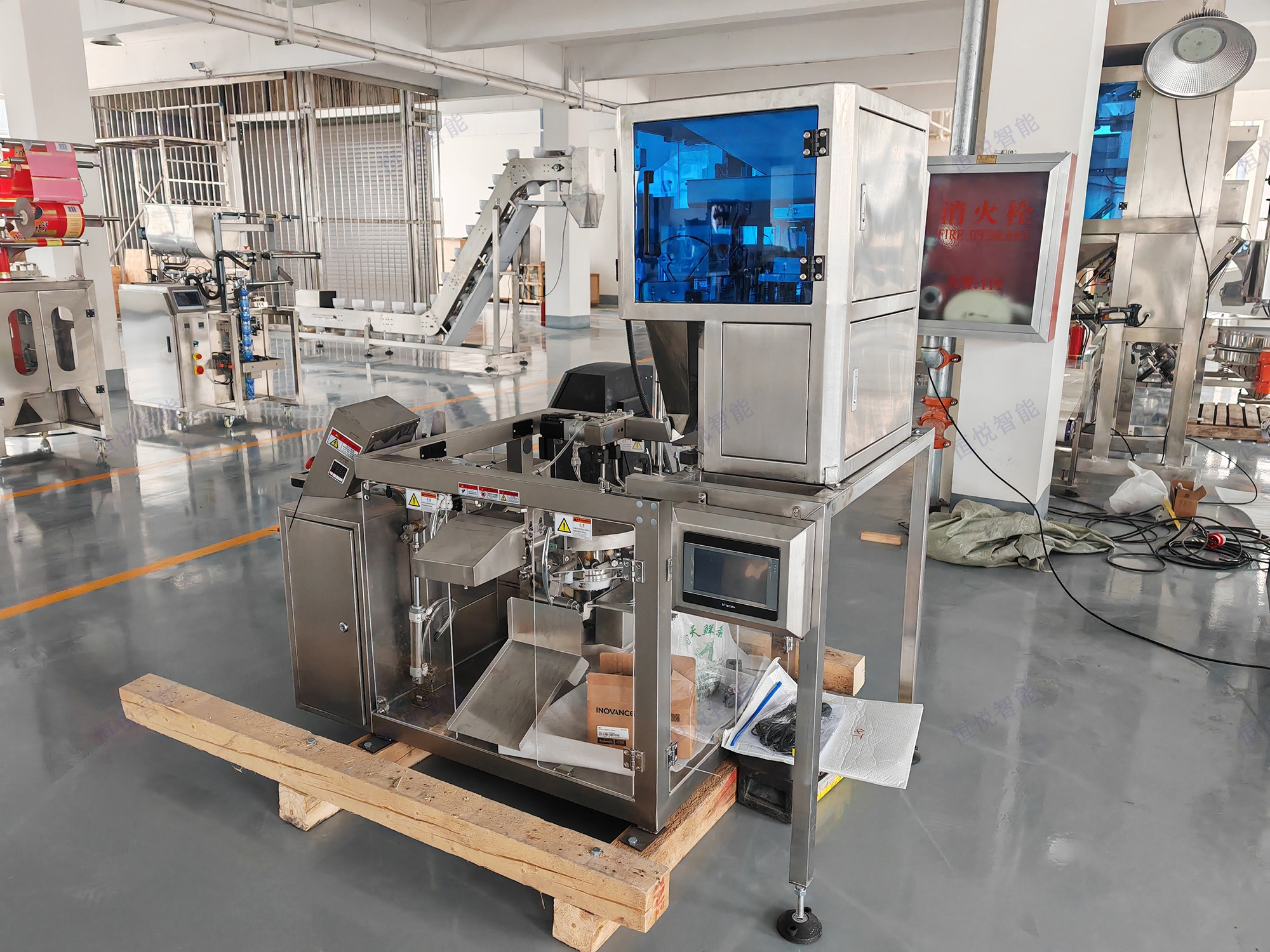 小型六工位给袋式自动包装机工作流程