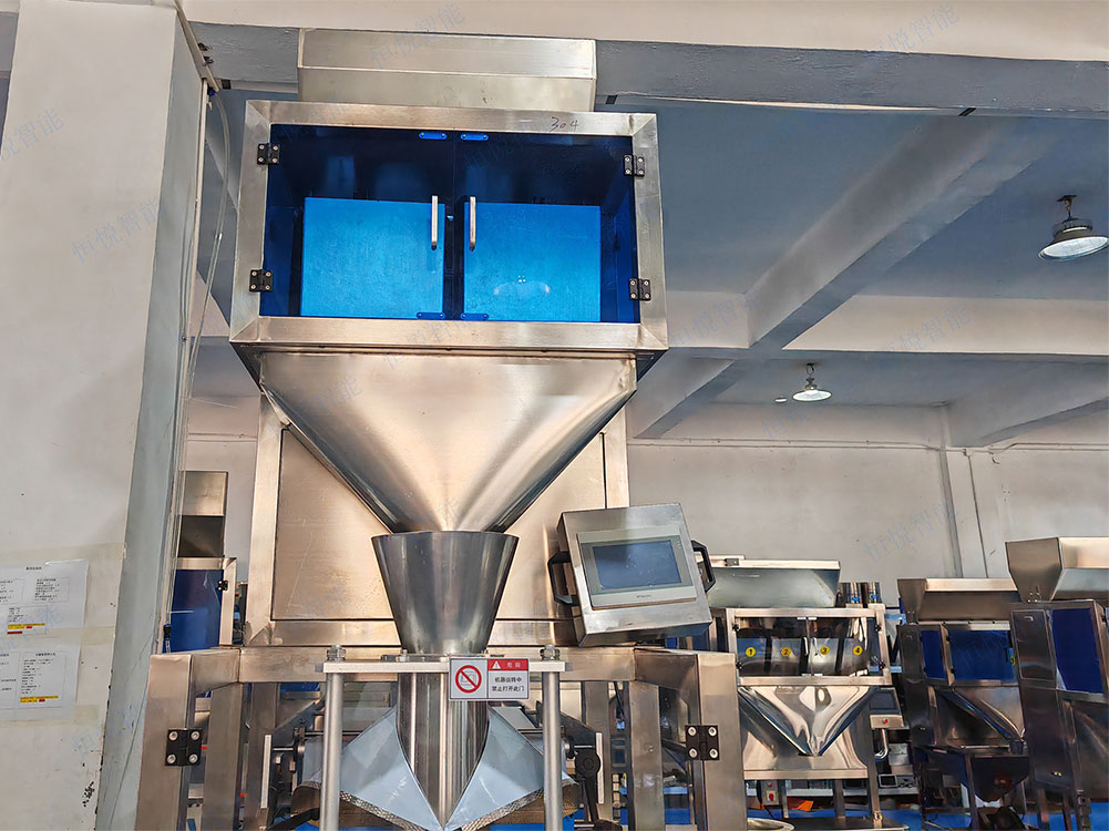 大米自动称重包装机主要由称重系统、给料系统、包装系统和控制系统等组成